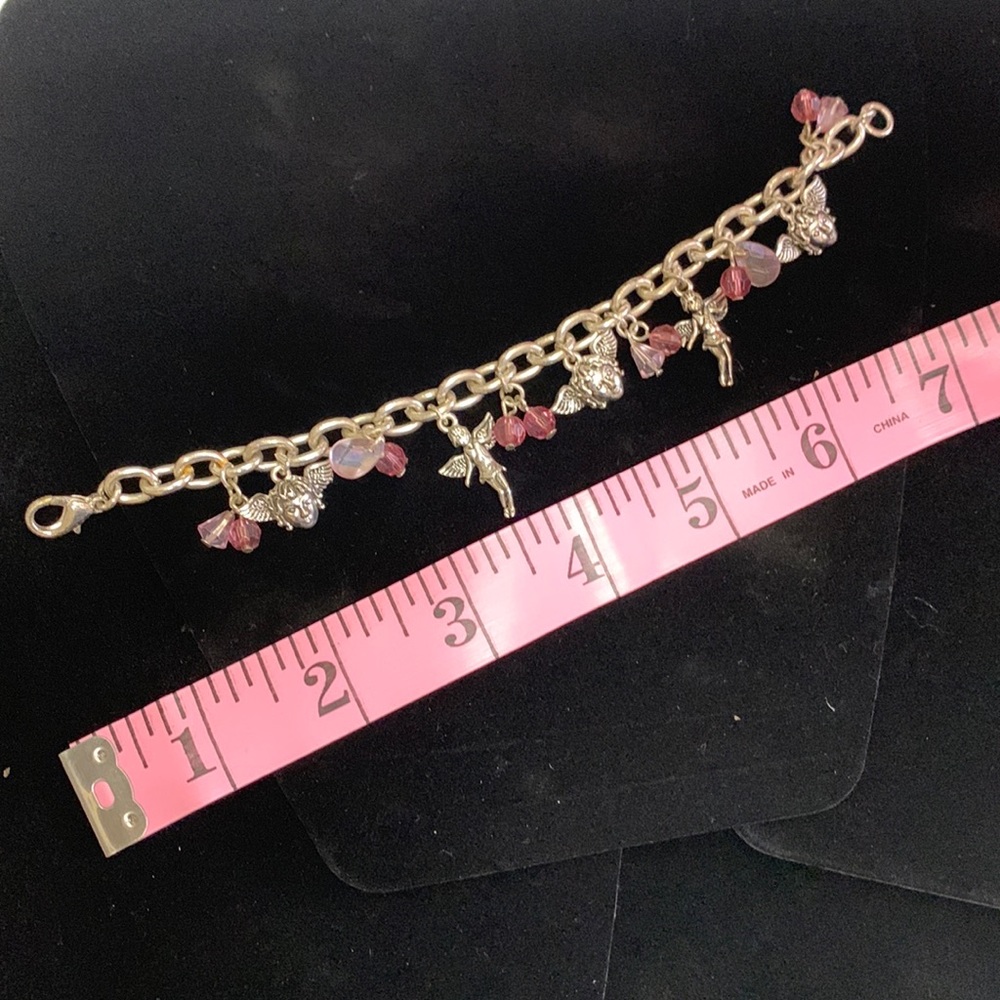 Pink and silver charm bracelet